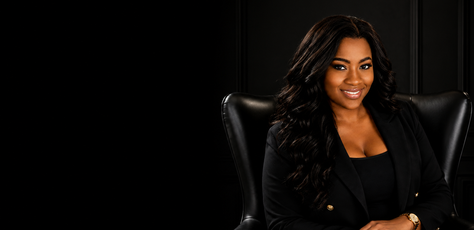 Jacquelyn Clayborn, executive advisor, seated in a dark executive chair